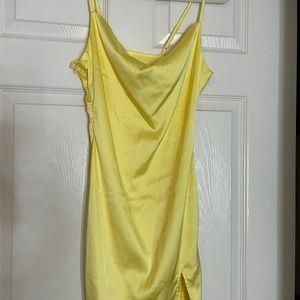 Yellow satin dress.